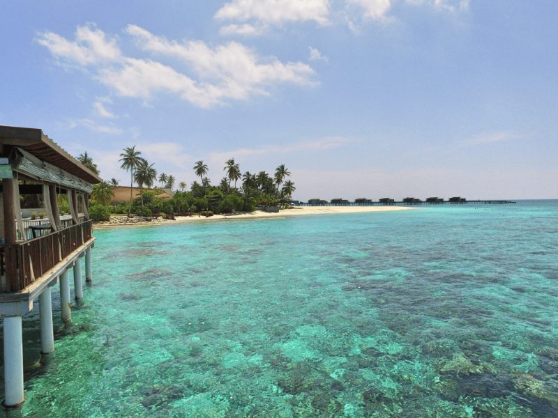 Drone view of Maldives, Indian Ocean, snorkeling, beach, luxury resort, luxury travel, travel bloggers, WorldTravelAdventurers, World Travel Adventurers, jetty