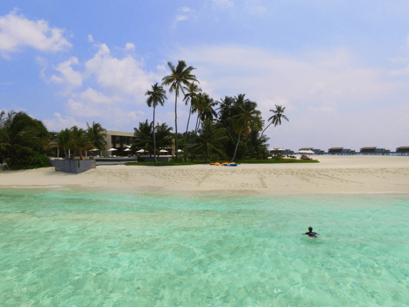 Drone view of Maldives, Indian Ocean, snorkeling, beach, luxury resort, luxury travel, travel bloggers, WorldTravelAdventurers, World Travel Adventurers, swim,