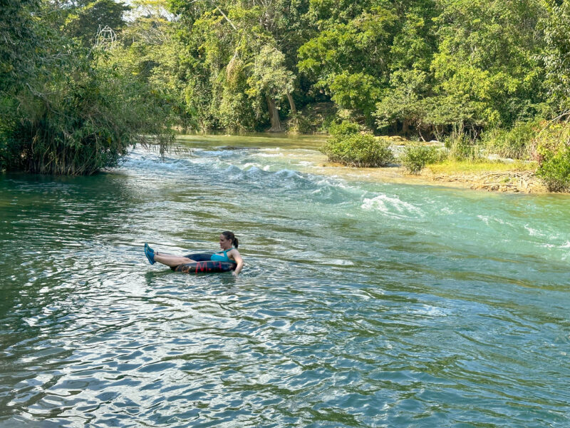 floating down Mopan River in an inner tube